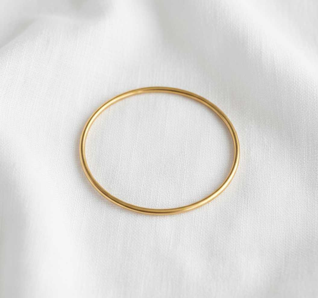 Éloïse – Jonc en acier inoxydable doré